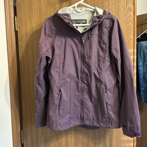 Hooded purple windbreaker